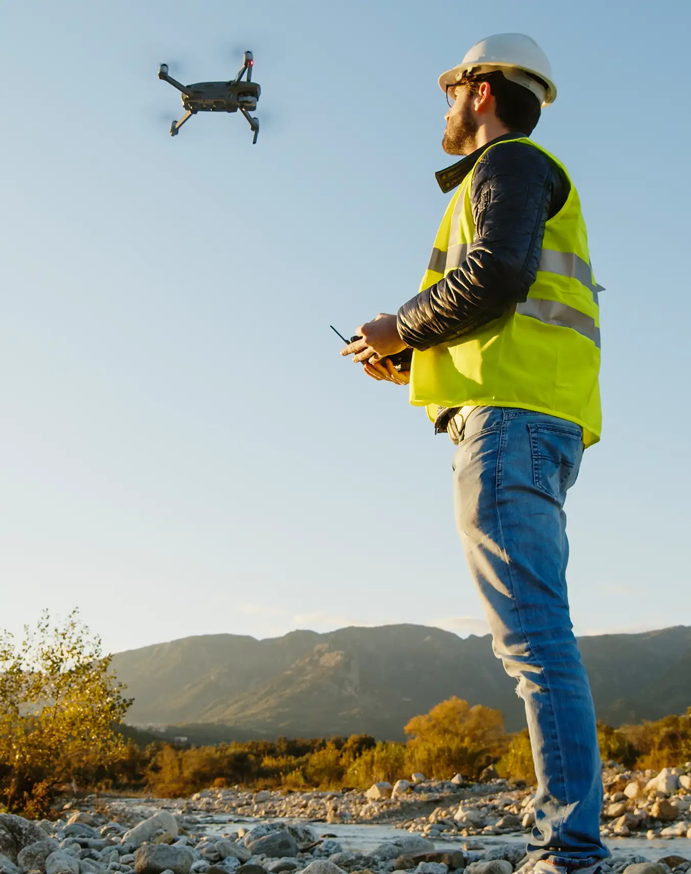 Man operating a drone