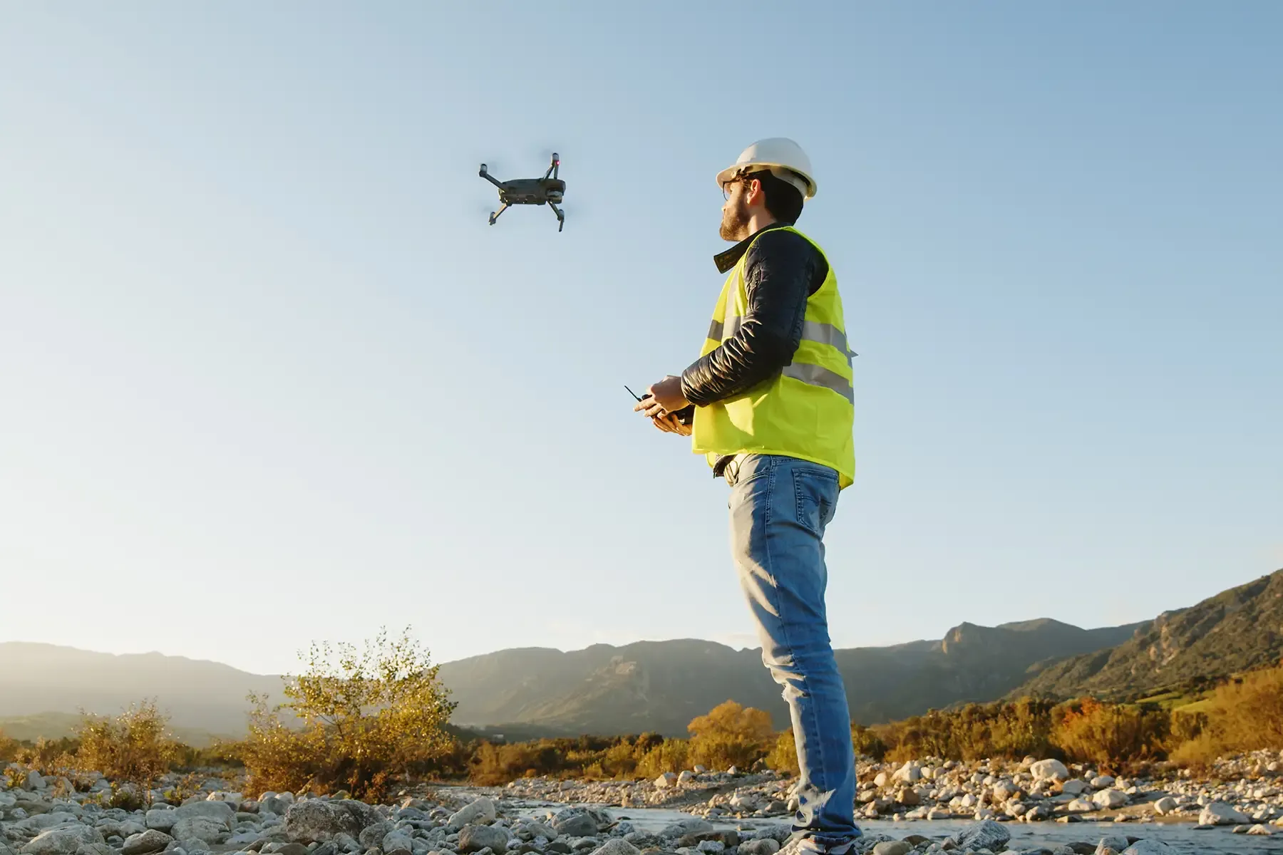 A paleontologist flying a drone